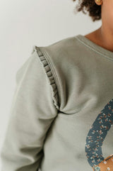 Girls Raw Edge Sweatshirt in Patchwork Peace Sign