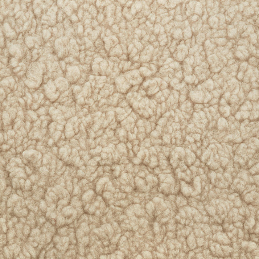 Kiwi Gliding Ottoman in Chai Shearling with Dark Wood Base