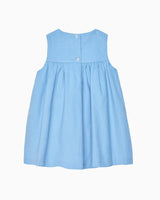 Baby Duck Smocked Pinafore in Blue Cord