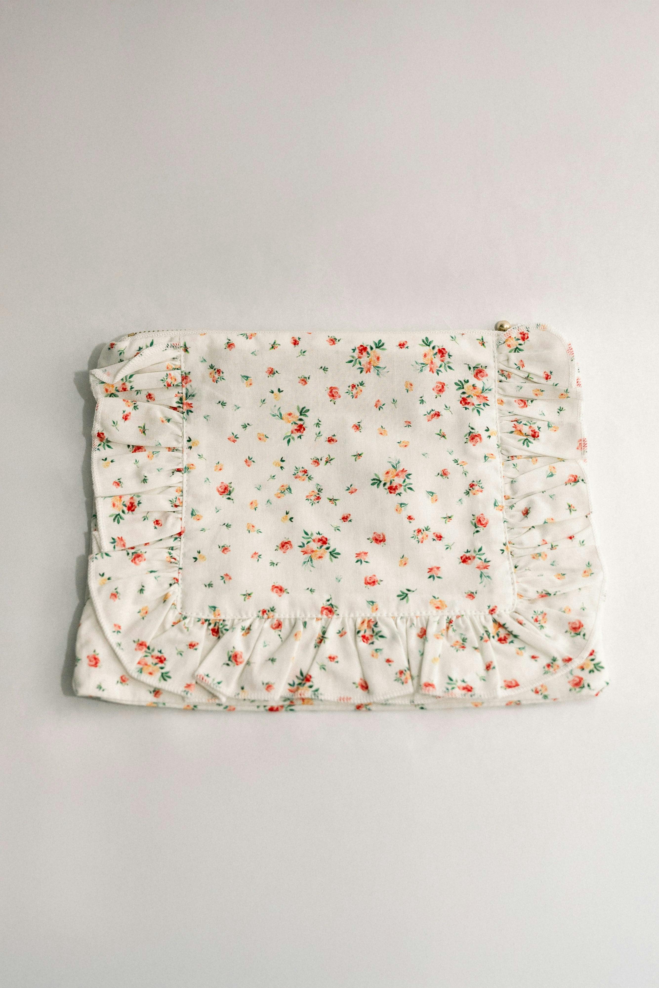 Clementine Bloom Timeless Floral Ruffle Zipper Pouch