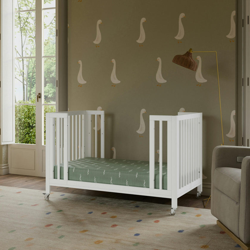 Rolli 9-in-1 Convertible All-Stages® Crib with Bassinet & Toddler Bed Conversion Kits in White