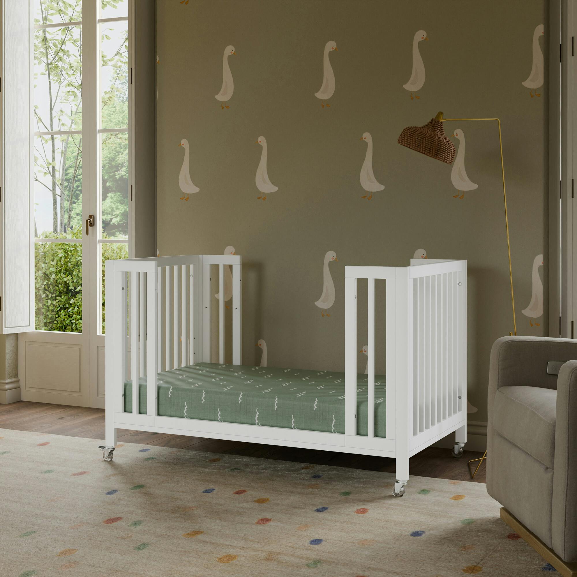 Rolli 9-in-1 Convertible All-Stages® Crib with Bassinet & Toddler Bed Conversion Kits in White