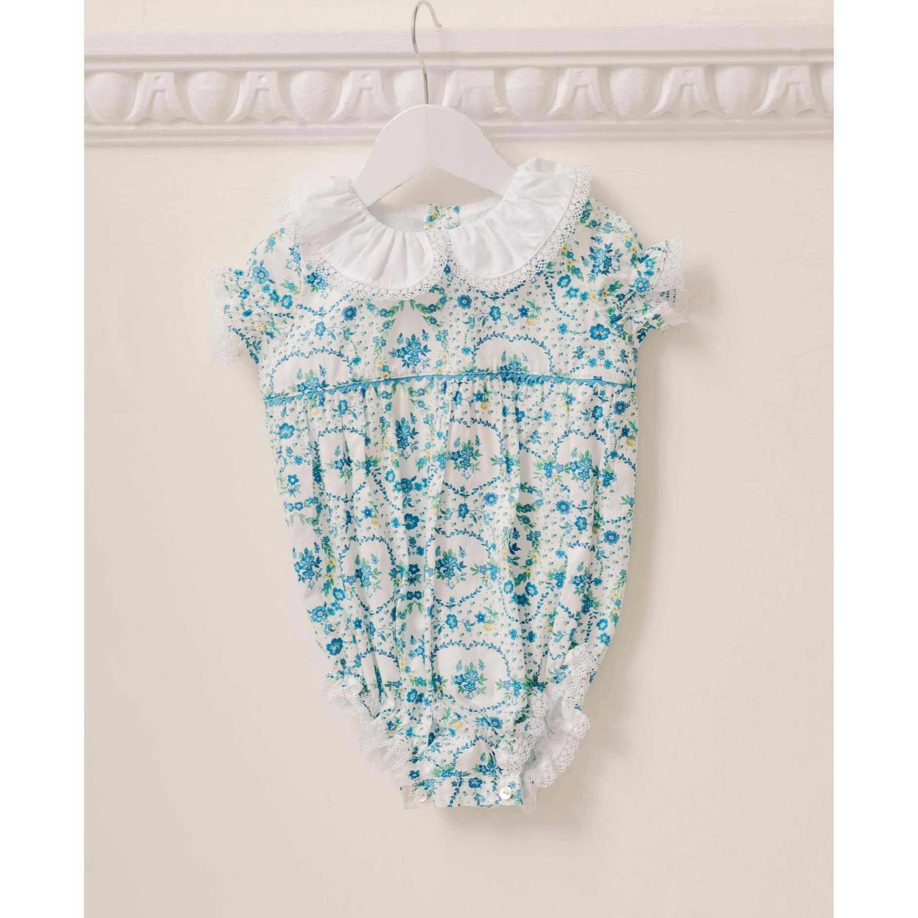 Nicky Hilton x La Coqueta Blue Bow Floral Lily-Grace Baby Girl Romper