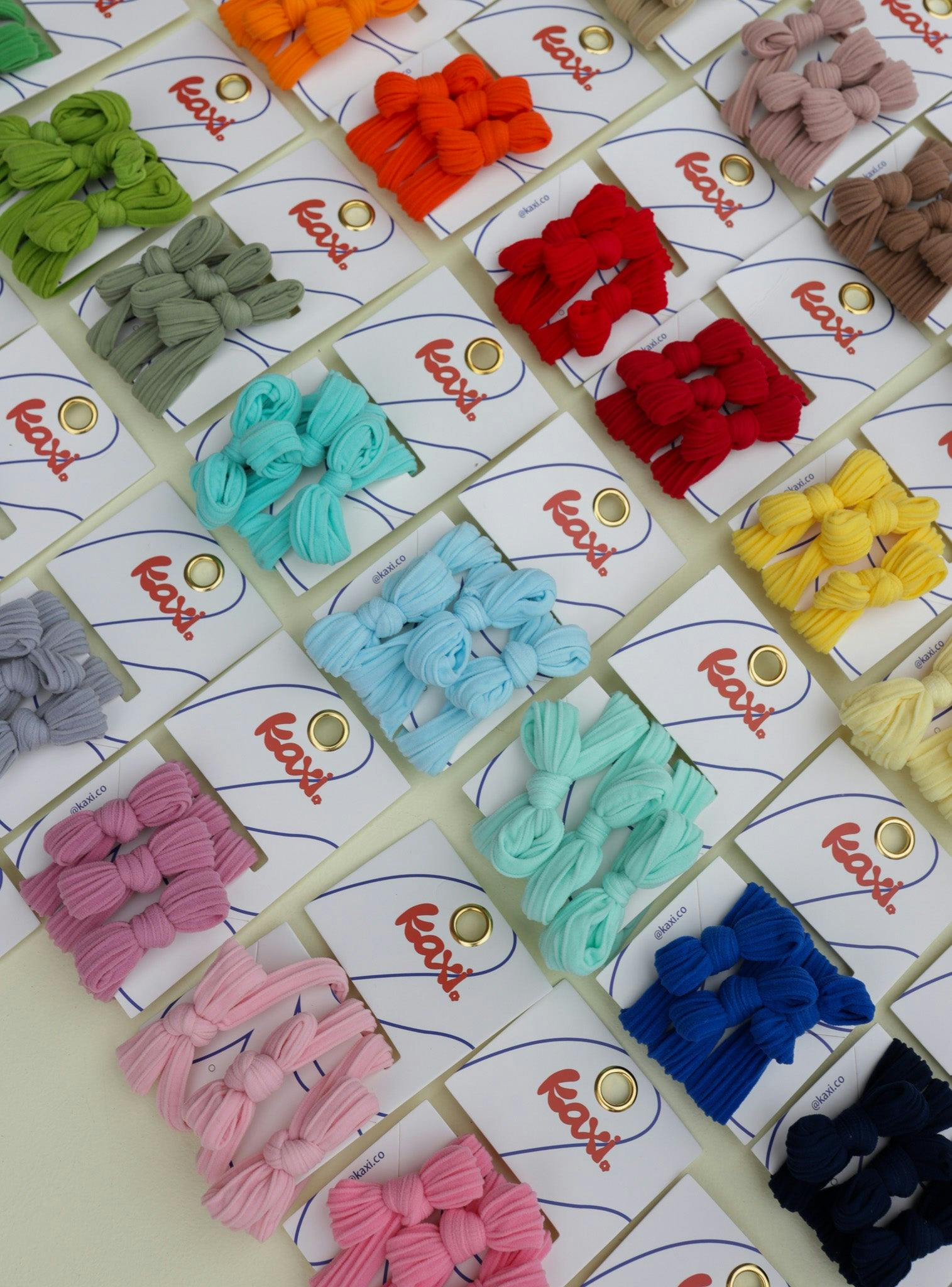 BOW SLICK BACK PONYTAILS (PACK OF 3)