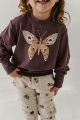 Girls Ruffle Hem Sweatshirt in Butterfly