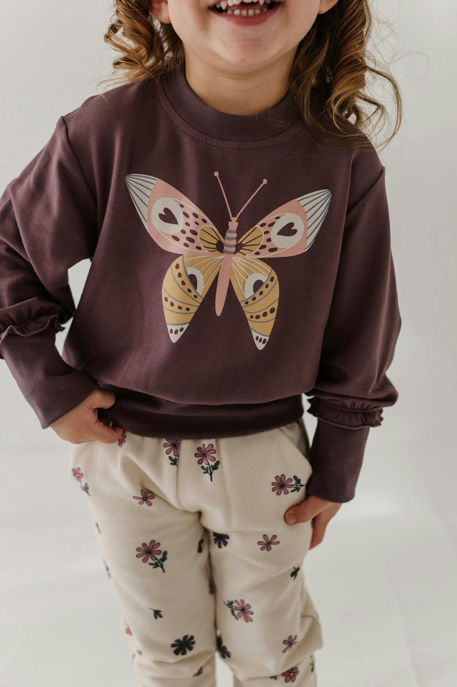 Girls Ruffle Hem Sweatshirt in Butterfly