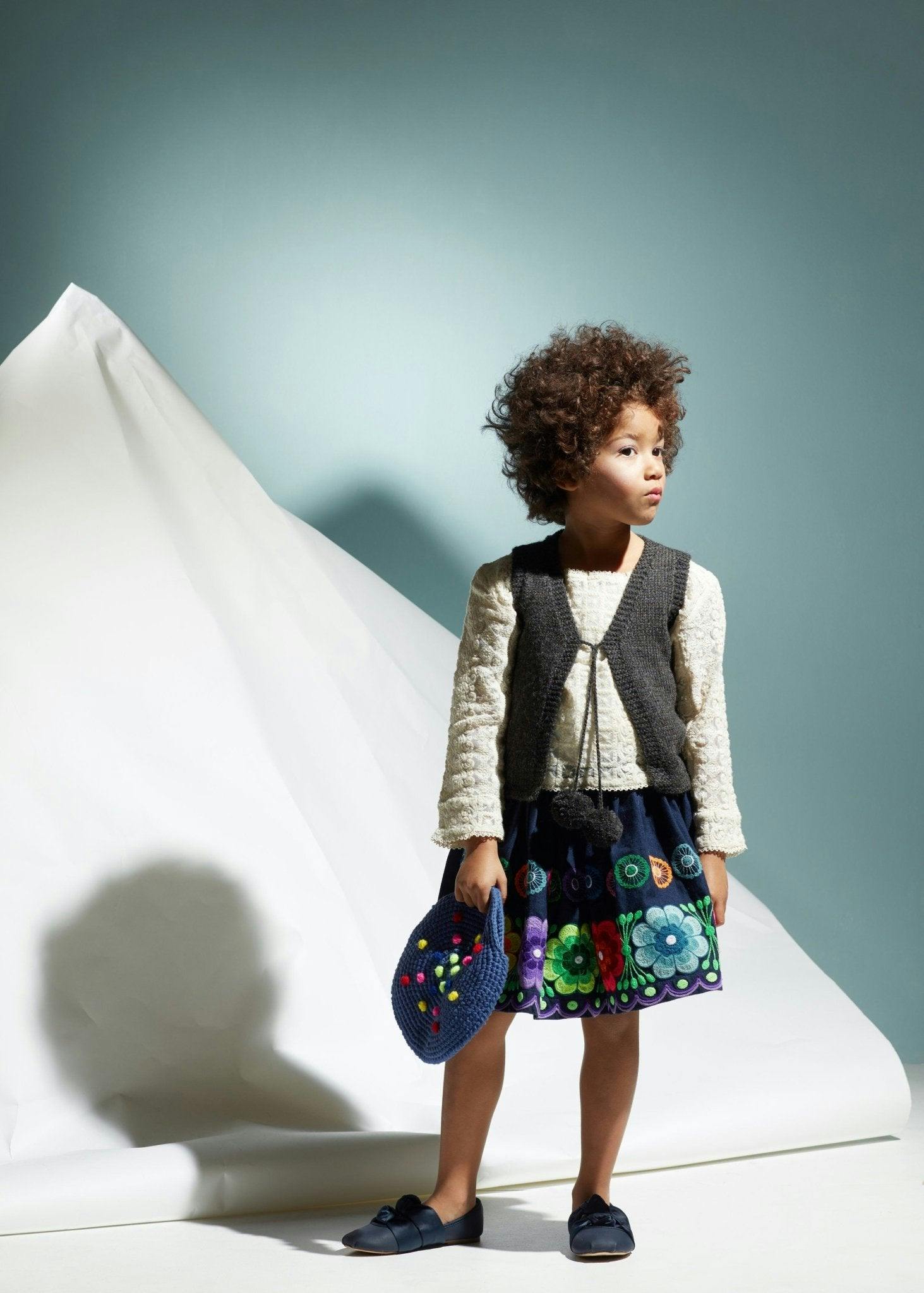 Pom Vest