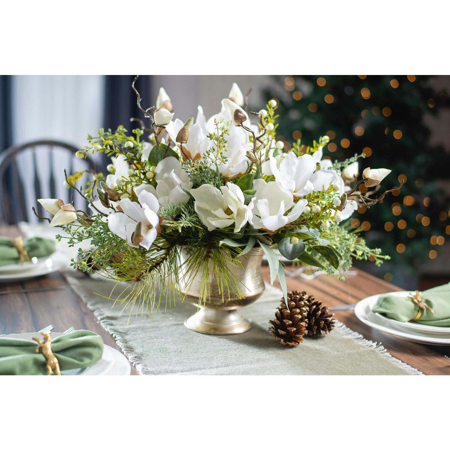 Winter White Magnolia, Pine & Snowberry Christmas Arrangement Centerpiece in Antiqued Silver Metal Urn