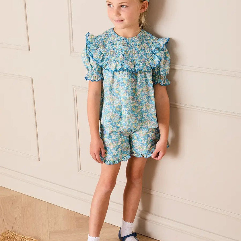 Leontyne Floral Scalloped Smocked Detail Short Sleeve Blouse in Blue Made with Liberty Fabric (2- 10yrs)