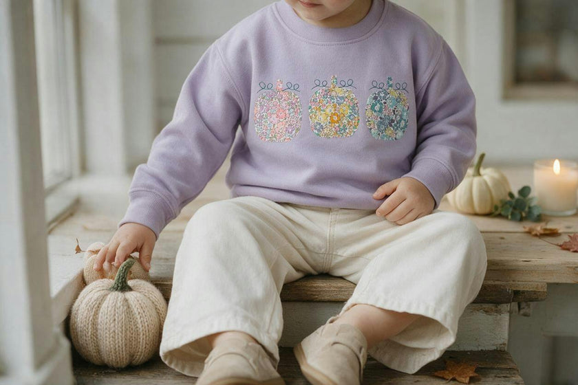 Liberty of London children's pumpkins design purple jumper