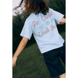women's t-shirt – go outside look inside