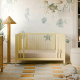 Rolli 9-in-1 Convertible All-Stages® Crib with Bassinet & Toddler Bed Conversion Kits in Pale Yellow