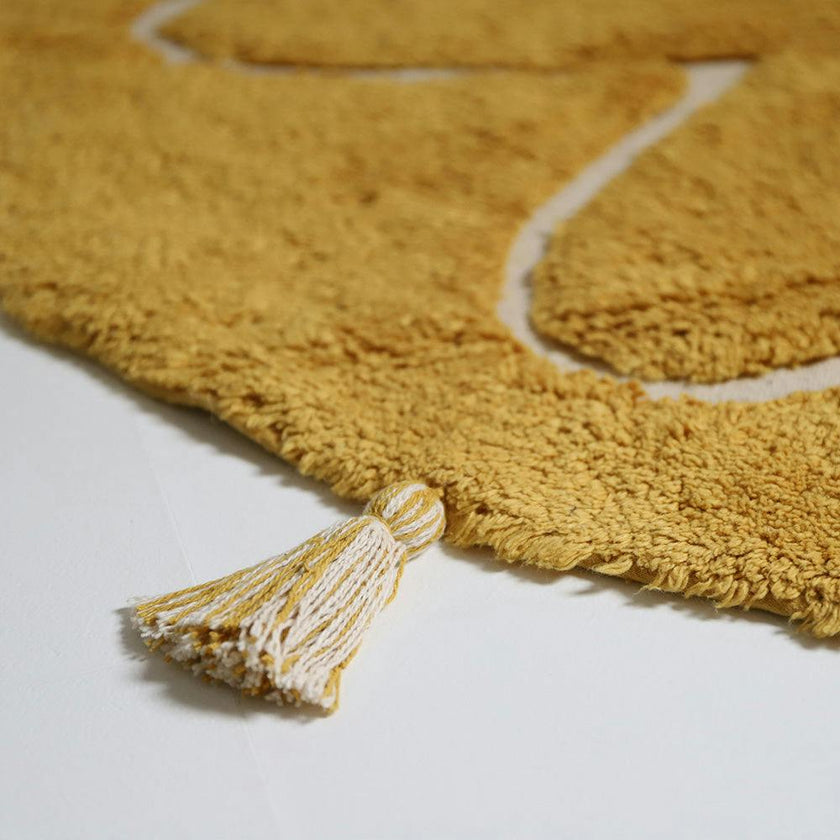 YVA Mango bohemian children's rug with pompoms