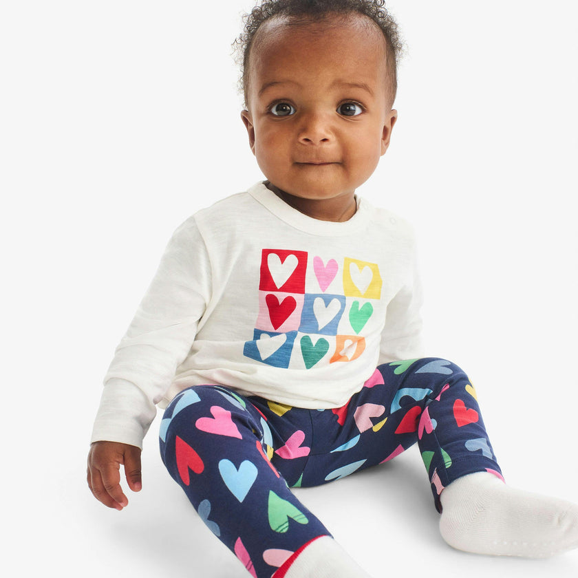 Baby legging in rainbow candy hearts
