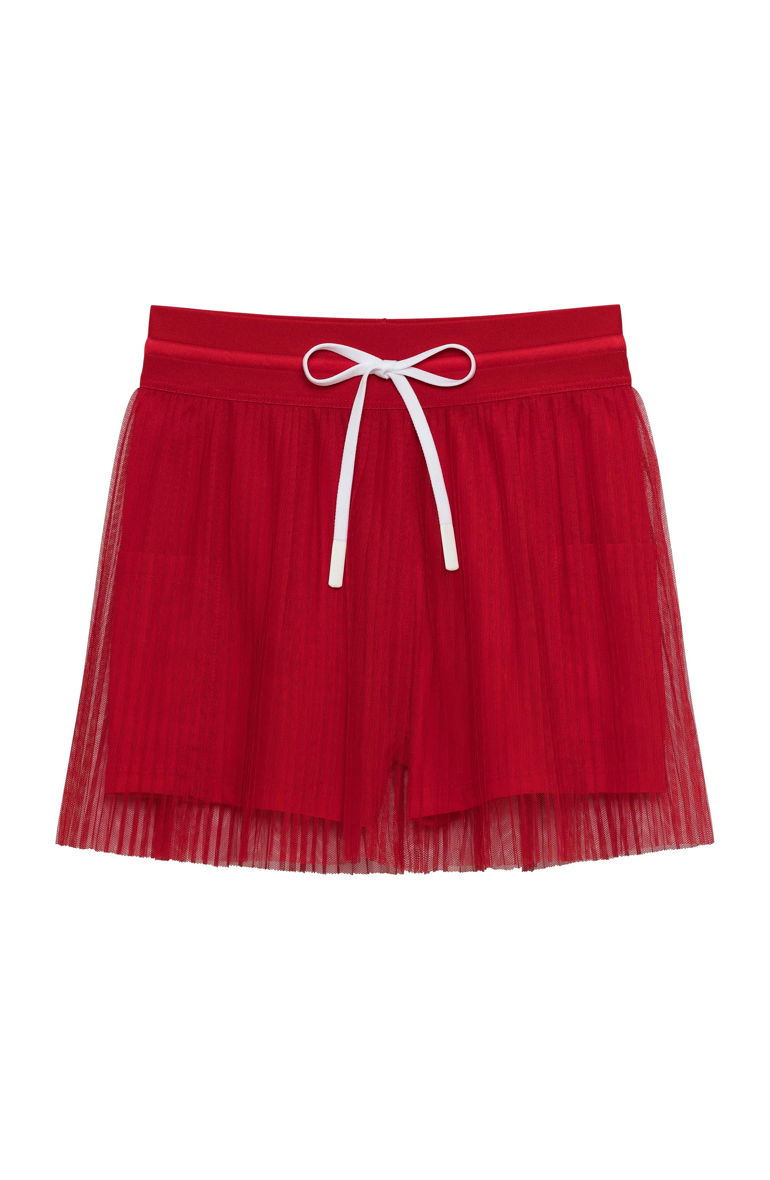 red pleated skort