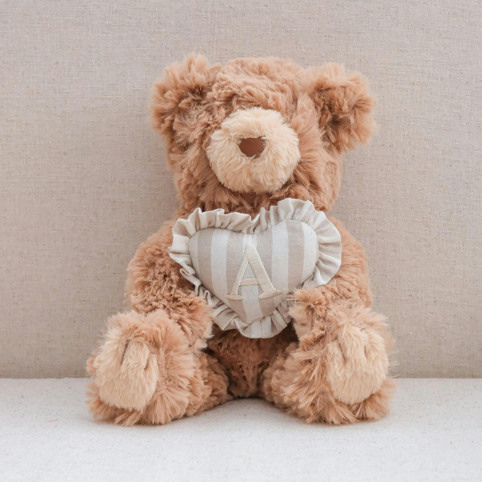 INITIAL TEDDY