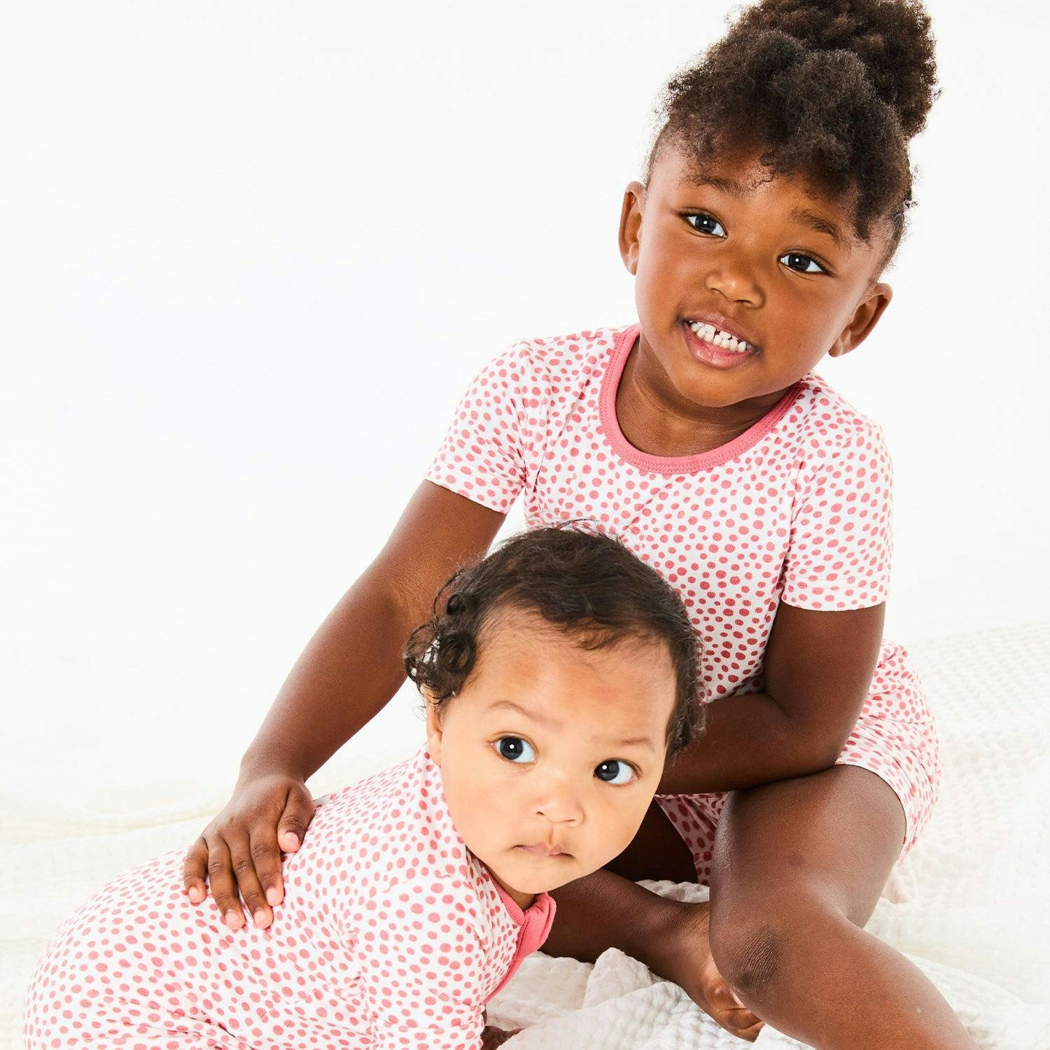 Soft & Stretchy Zipper Footie - Coral Dots