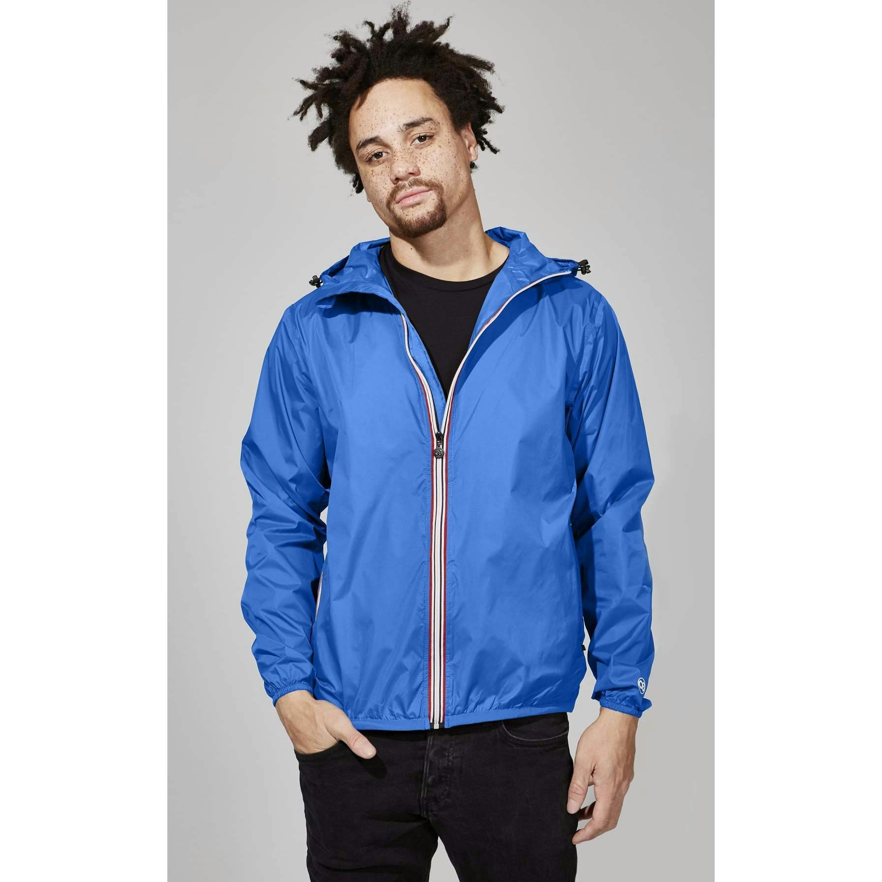 Women's royal blue full zip packable rain jacket and windbreaker