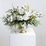 Winter White Magnolia, Pine & Snowberry Christmas Arrangement Centerpiece in Antiqued Silver Metal Urn