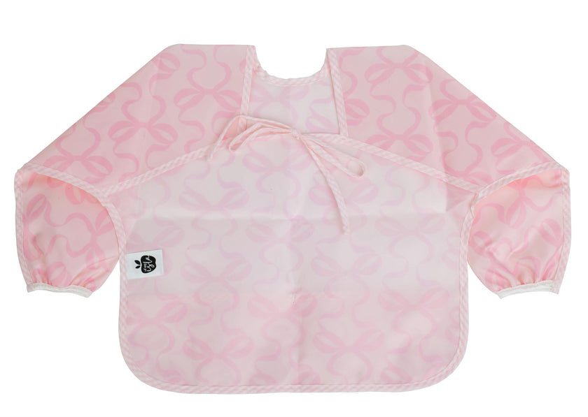 The Cover Everything Bib in Bows on Pink