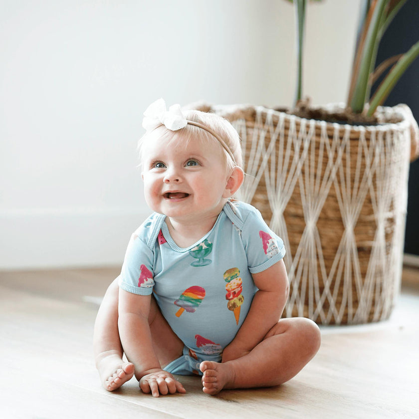 Wren baby body onesie