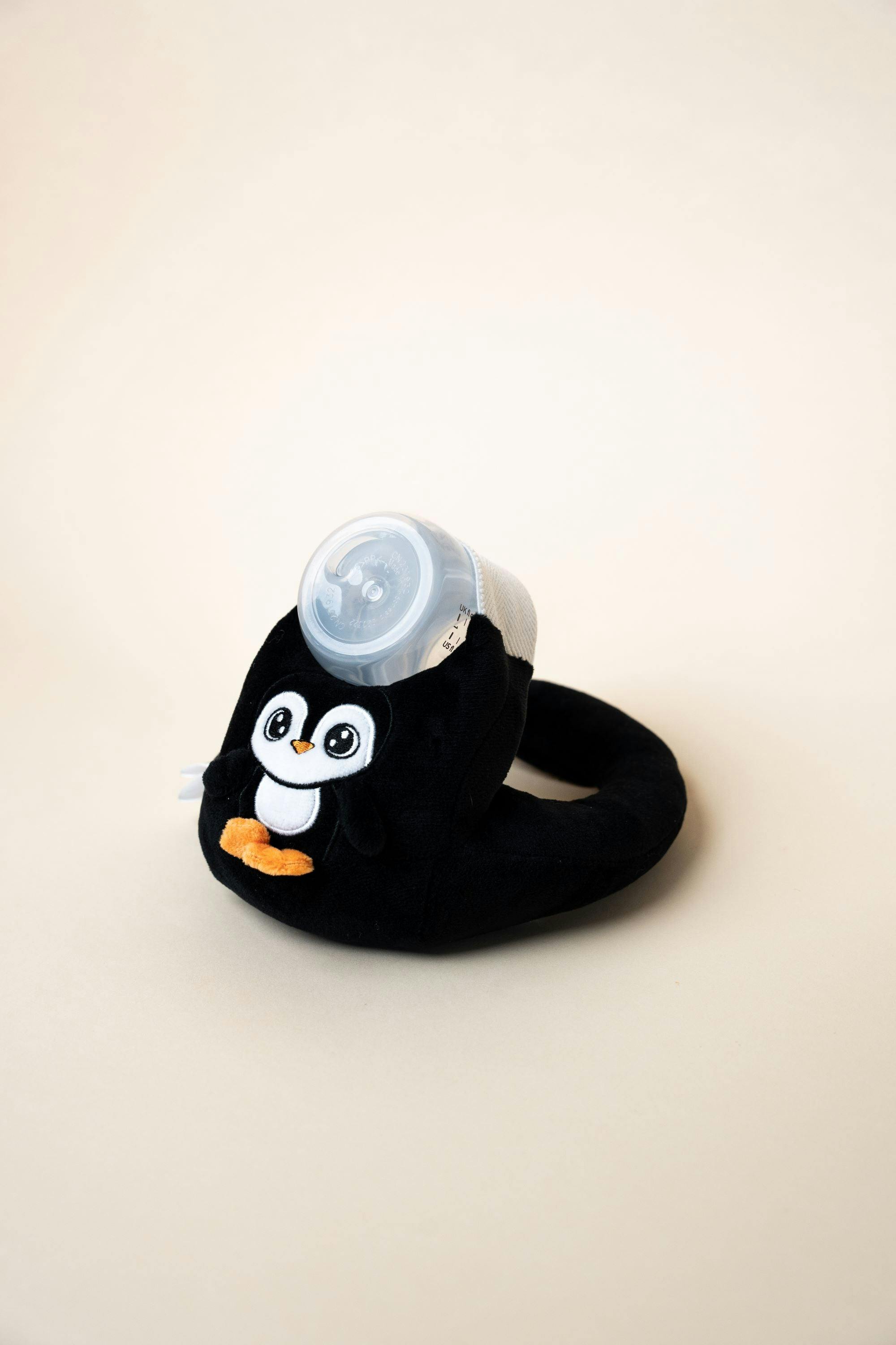 Baby Bottle Pillow Holder For Parents - Penguin