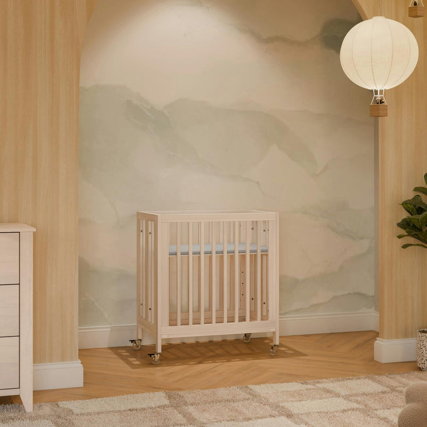 Rolli 9-in-1 Convertible All-Stages® Crib with Bassinet & Toddler Bed Conversion Kits in Washed Natural