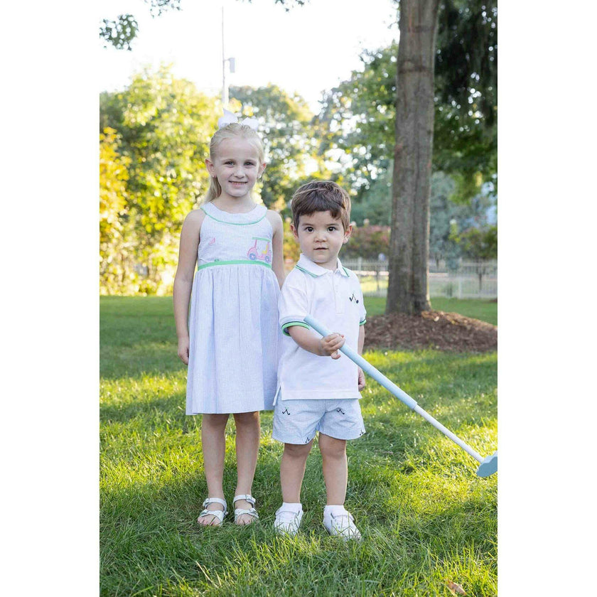Knit Polo With Golf Clubs