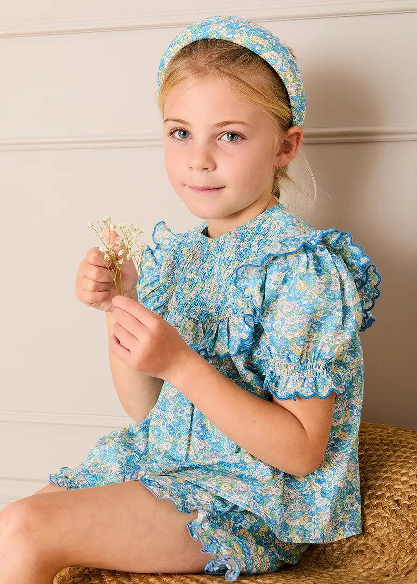 Leontyne Floral Scalloped Smocked Detail Short Sleeve Blouse in Blue Made with Liberty Fabric (2- 10yrs)