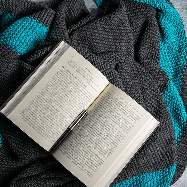 Marici Throw Blanket
