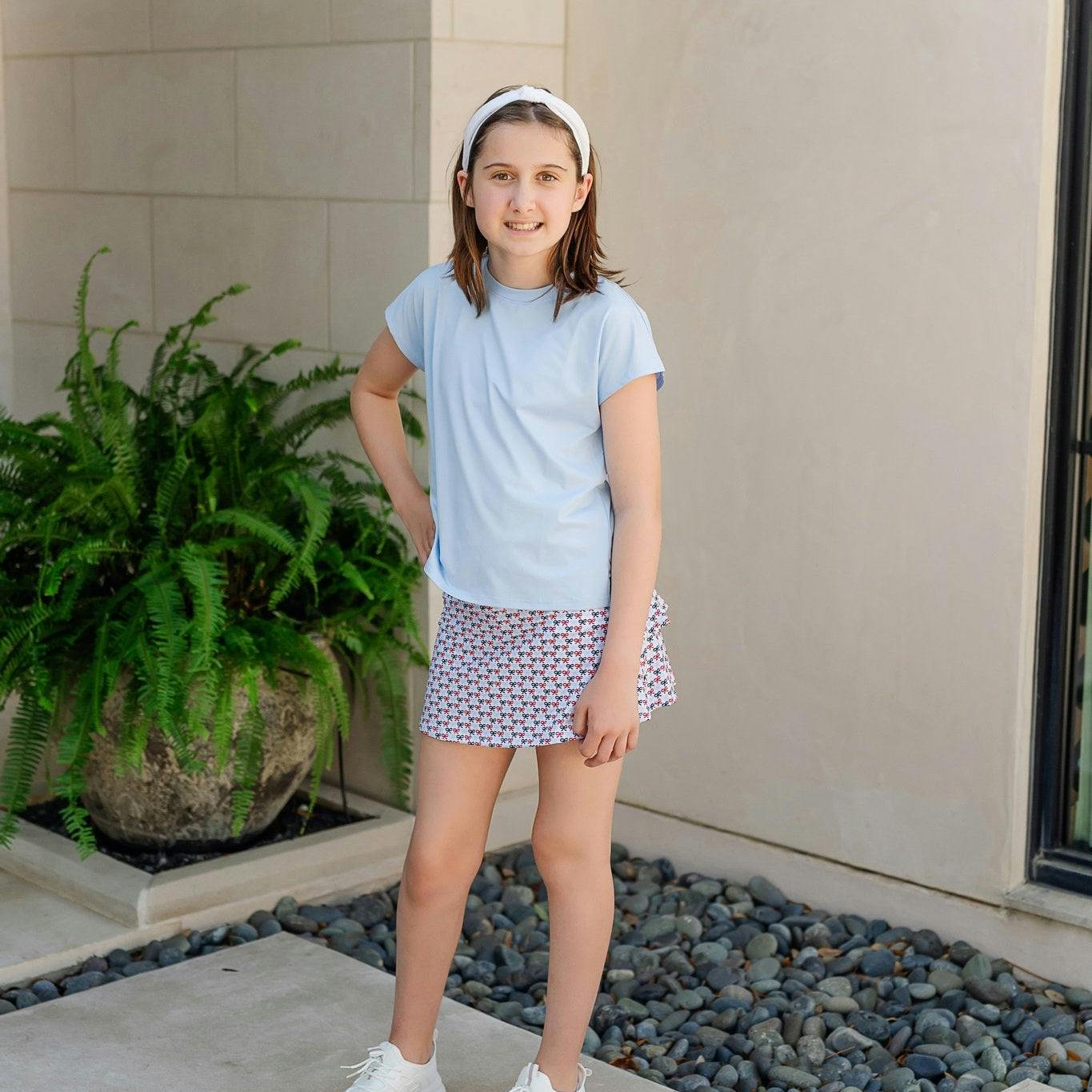 Sloane Girls' Short Sleeve Performance Top by LH Sport - Light Blue