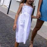 girls shell white cross back pinafore dress