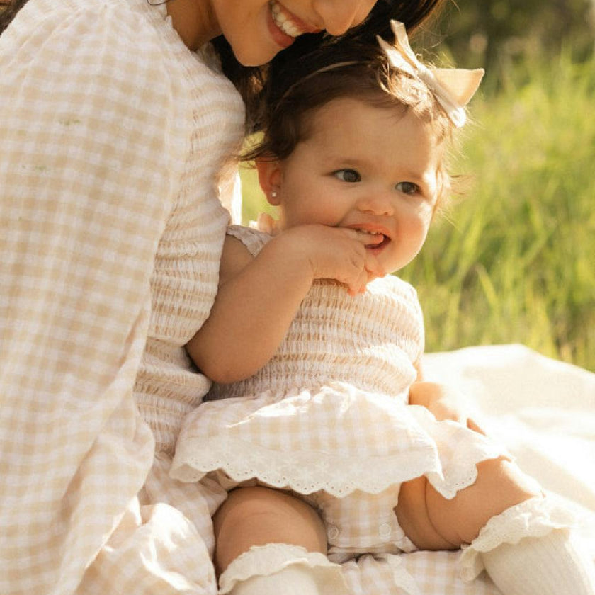 Baby Presley Sleeveless Romper in Cream Gingham