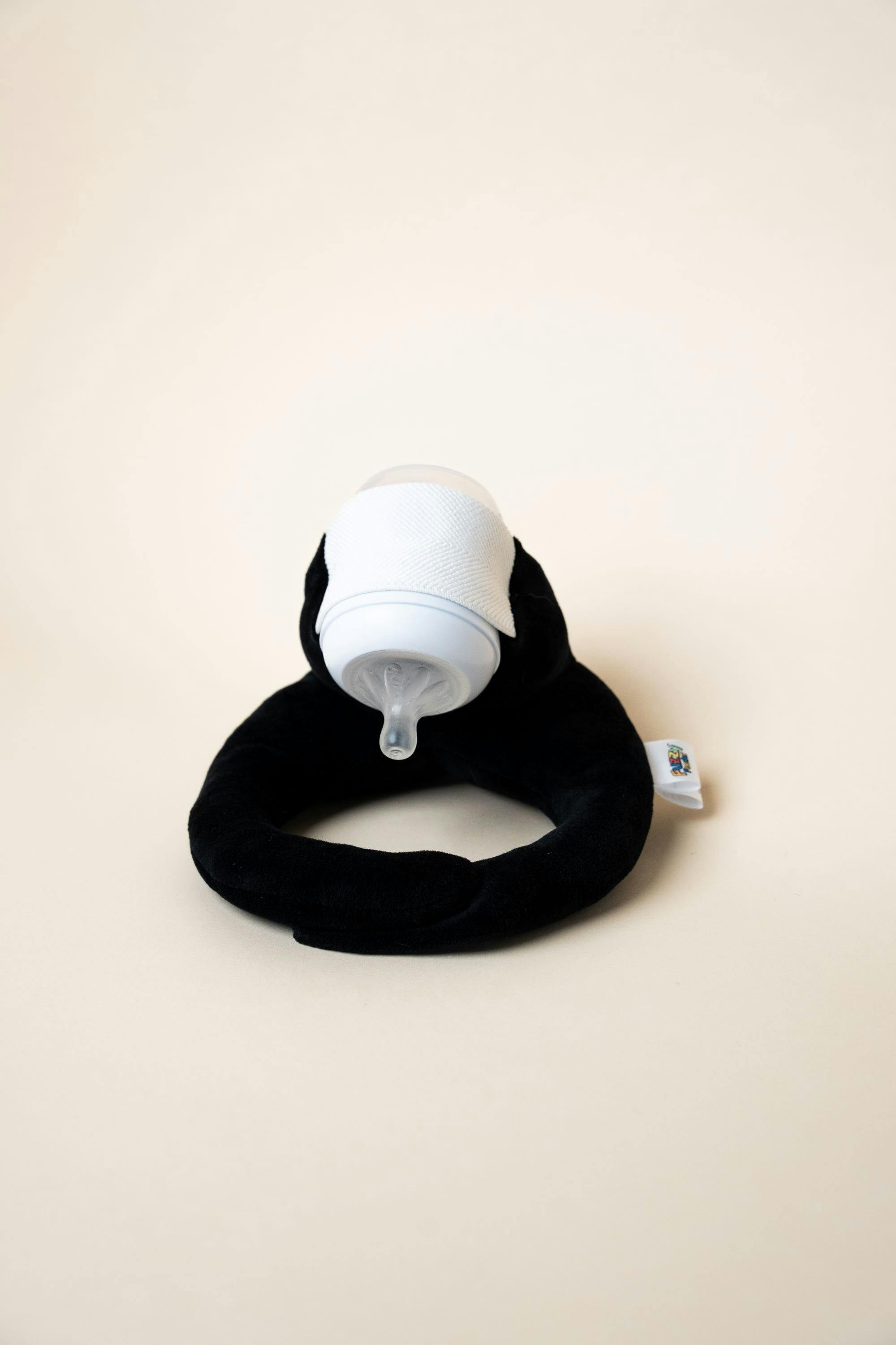 Baby Bottle Pillow Holder For Parents - Penguin