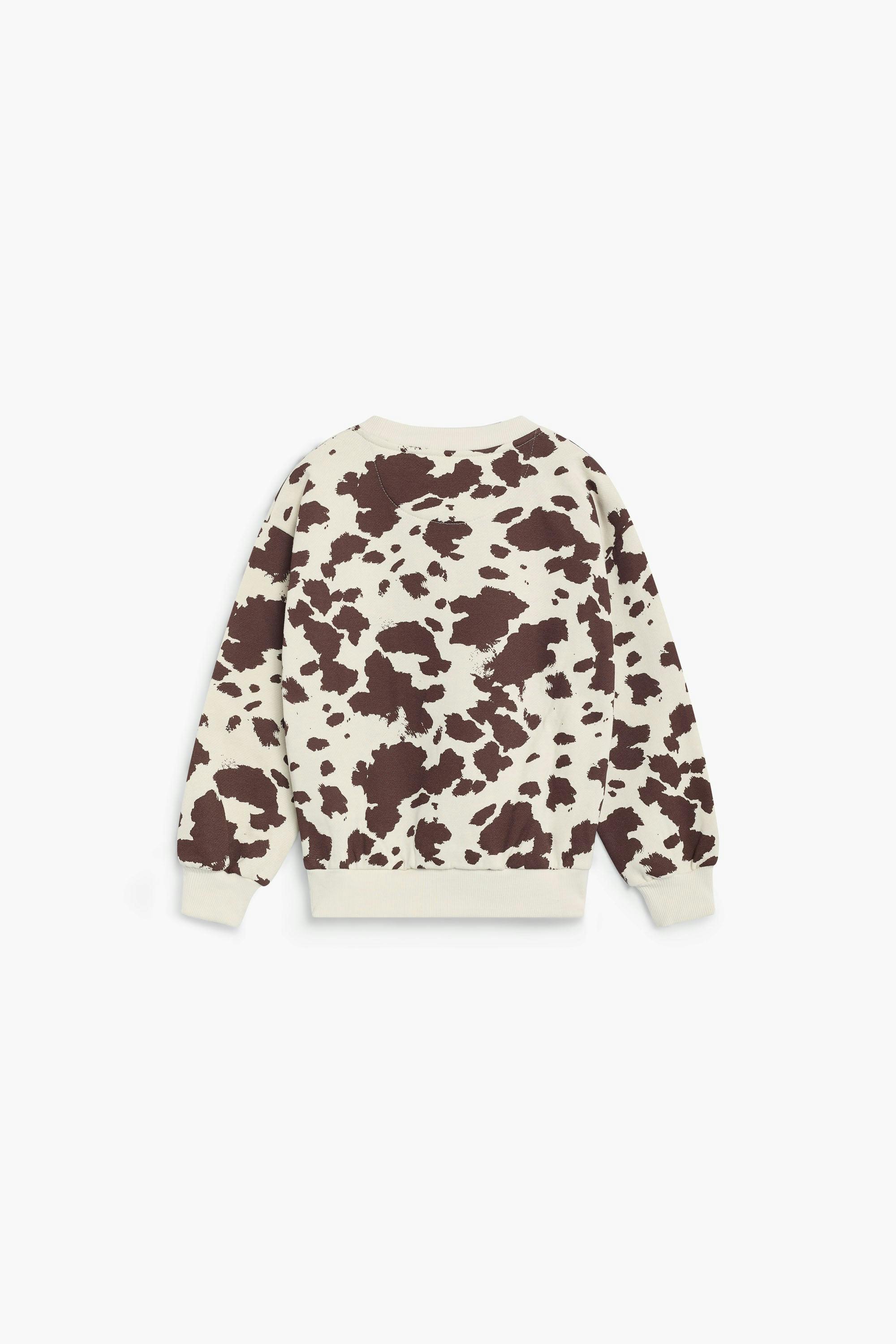 TNS Logo Sweatshirt Cow Print
