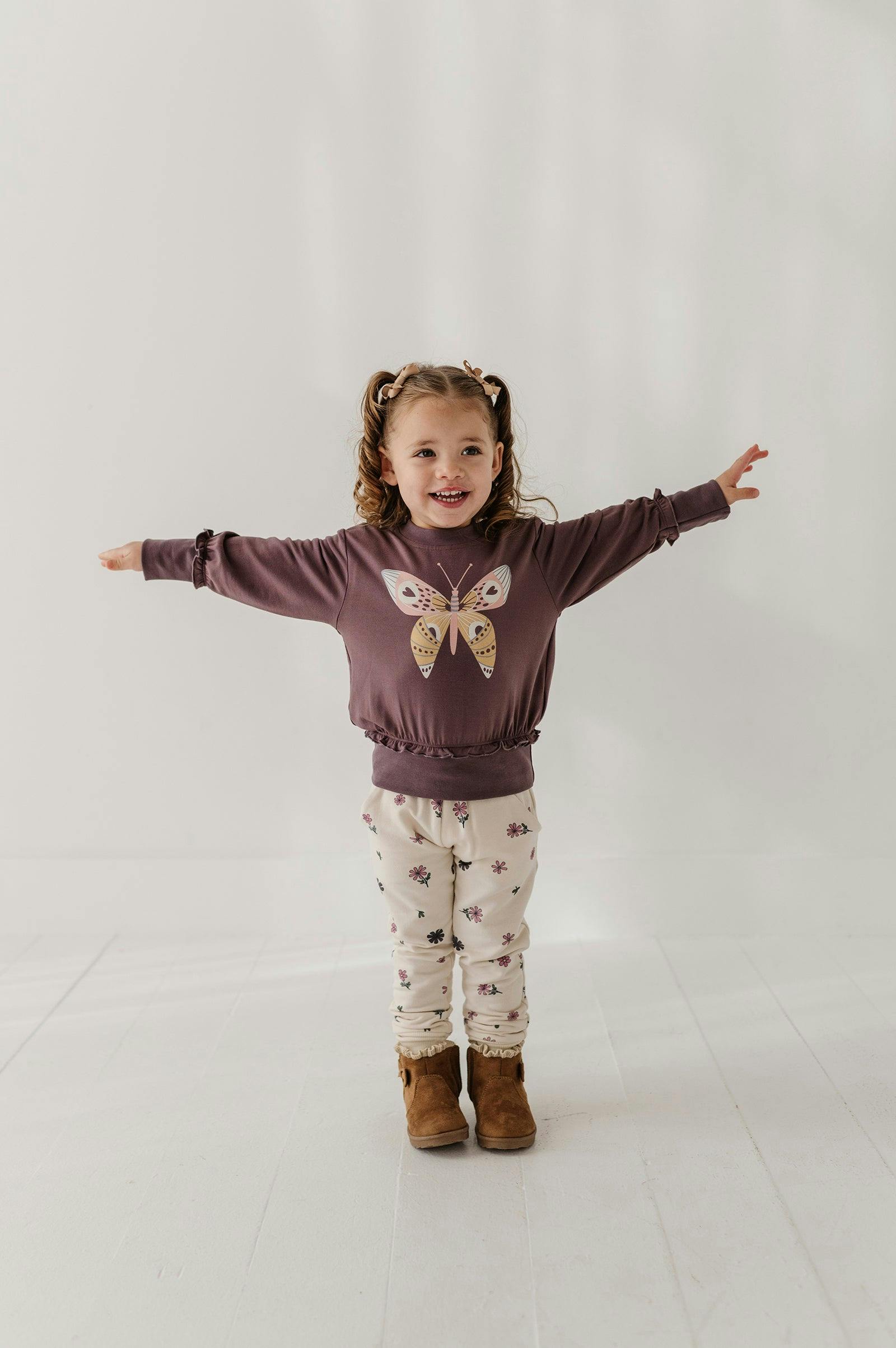 Girls Ruffle Hem Sweatshirt in Butterfly