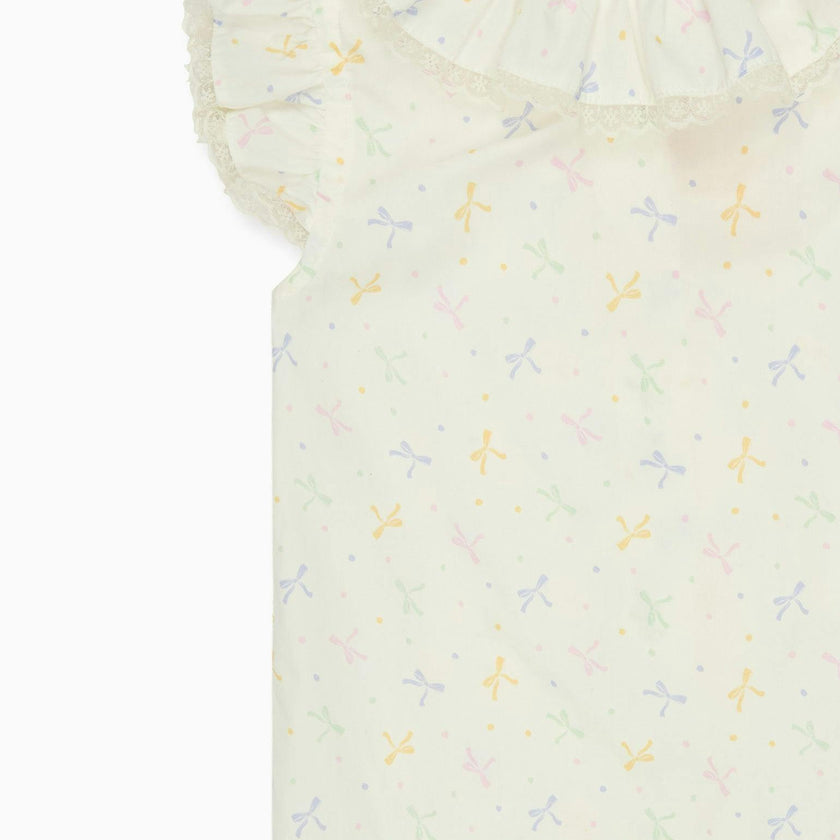Nicky Hilton x La Coqueta Ivory Bow Olivia Girl Shirt