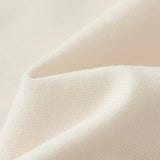 Salt Luxe Solid Kerchief Bib