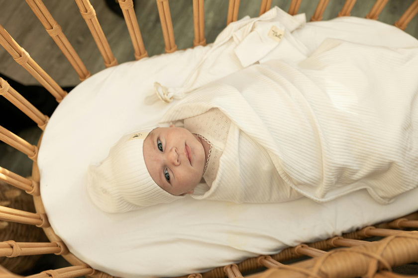 Gift Boxed Ribbed Textured Swaddle, Beanie, and Lovie Three Piece Set