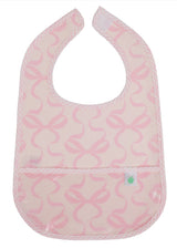 The Wipe It Bib in Bows on Pink