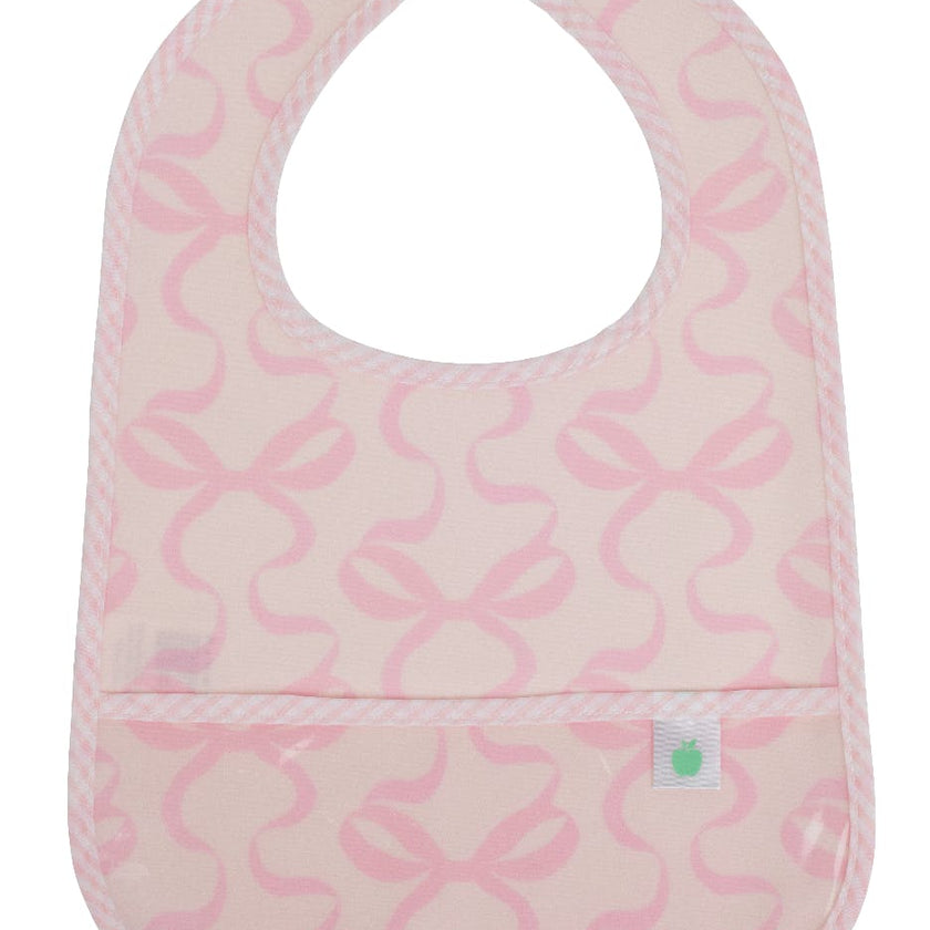 The Wipe It Bib in Bows on Pink
