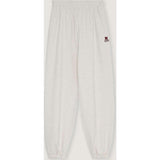 TNS Logo Woman Jogging  Sand Vigore