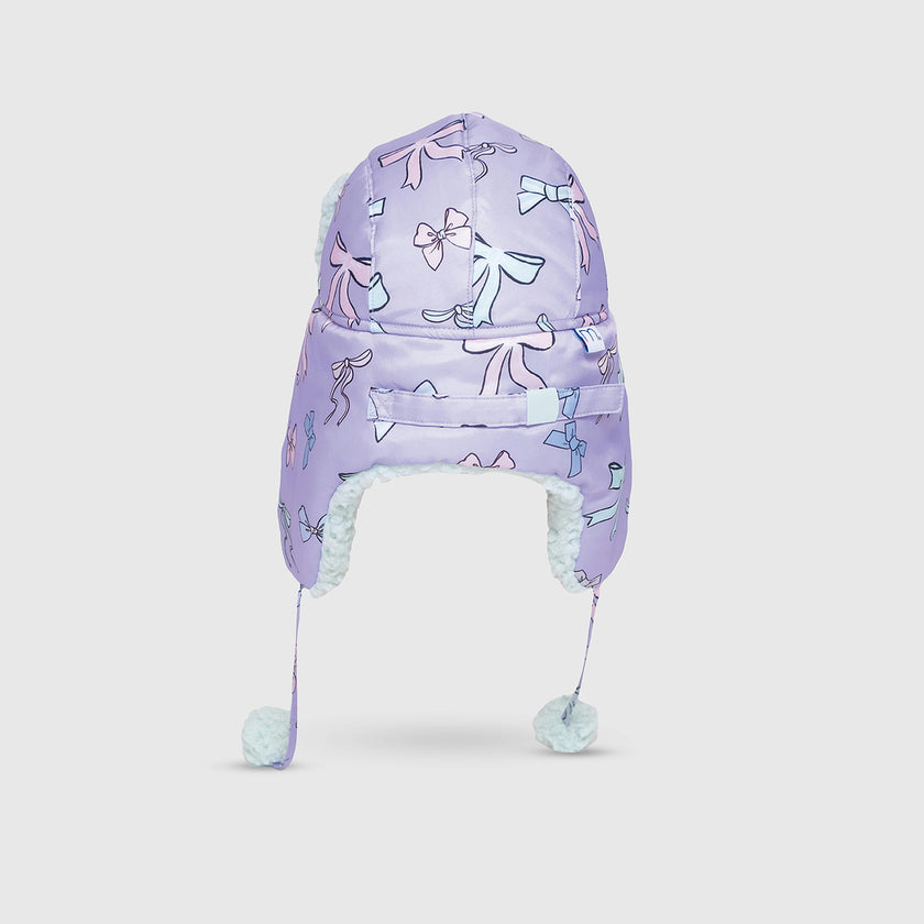 The Cozy Trapper Hat – Bows Print with Pale Aqua Sherpa Liner & Pompoms