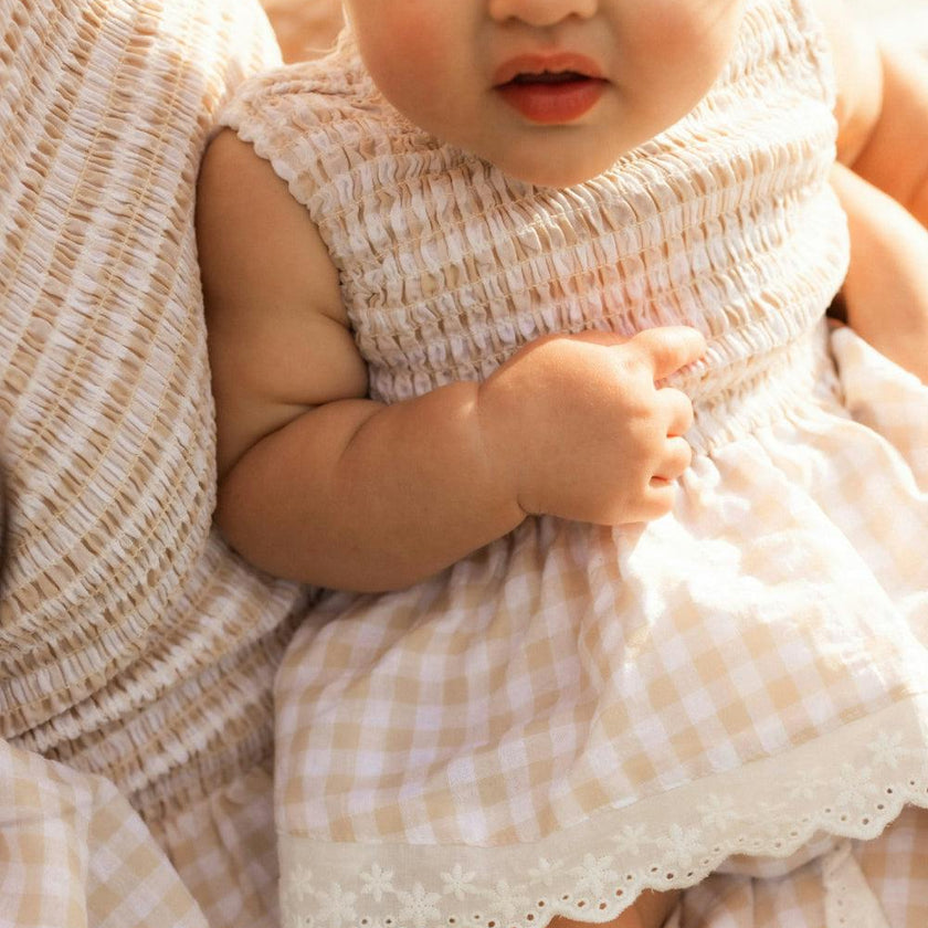 Baby Presley Sleeveless Romper in Cream Gingham