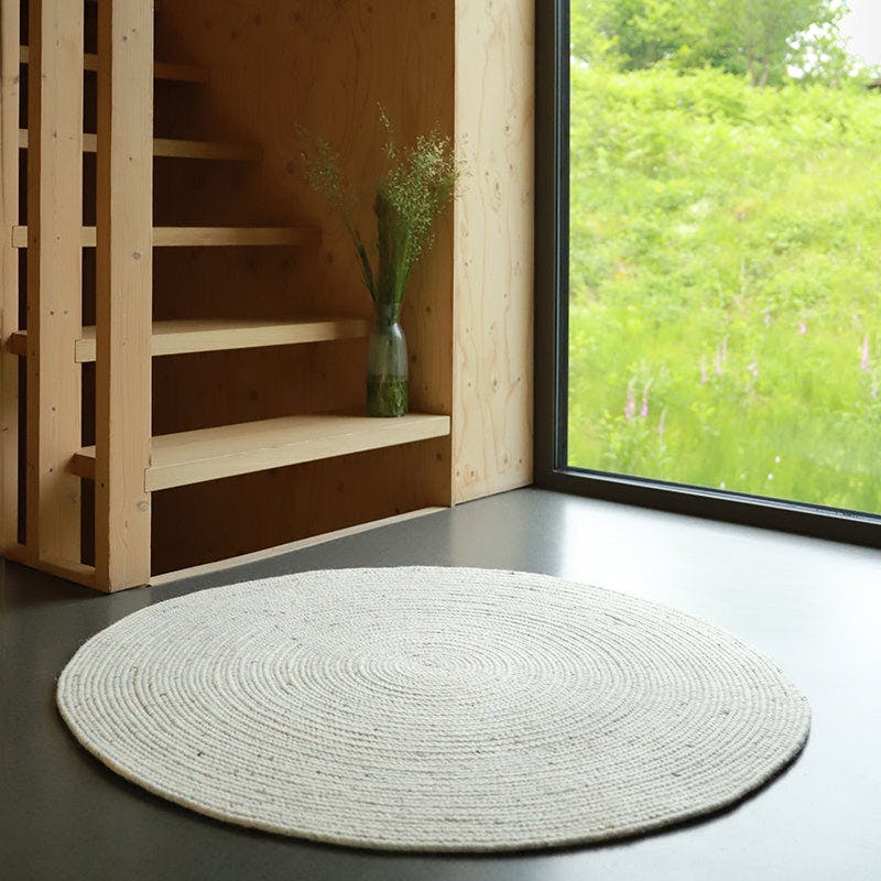 Neethu Hand-Crafted Felted Wool Round Rug, Natural