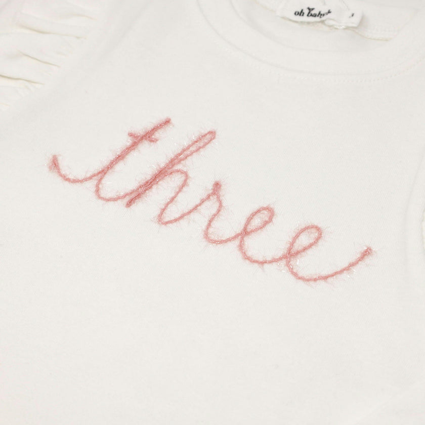 Millie Long Sleeve Tee in 'three' Pink Eyelash Writing