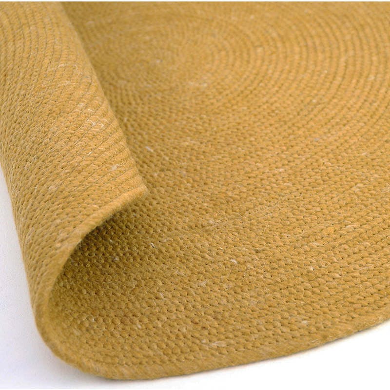 Neethu Hand-Crafted Felted Wool Round Rug, Yellow