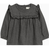 Sally Flannel Ruffle Neckline Top