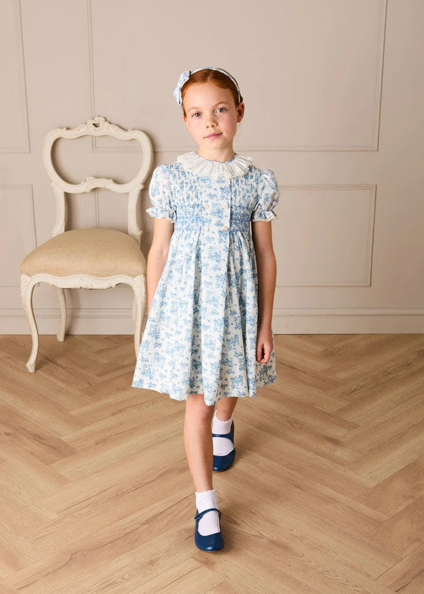 Audrey Toile Hand Smocked Ruffle Collar Short Sleeve Dress in Blue (12mths- 10yrs)