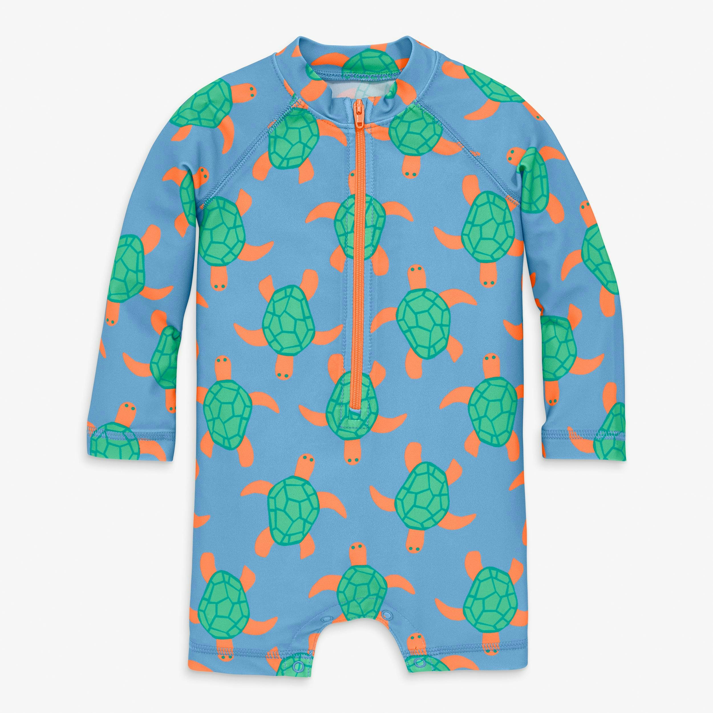 Baby one piece rash guard in swimming turtles